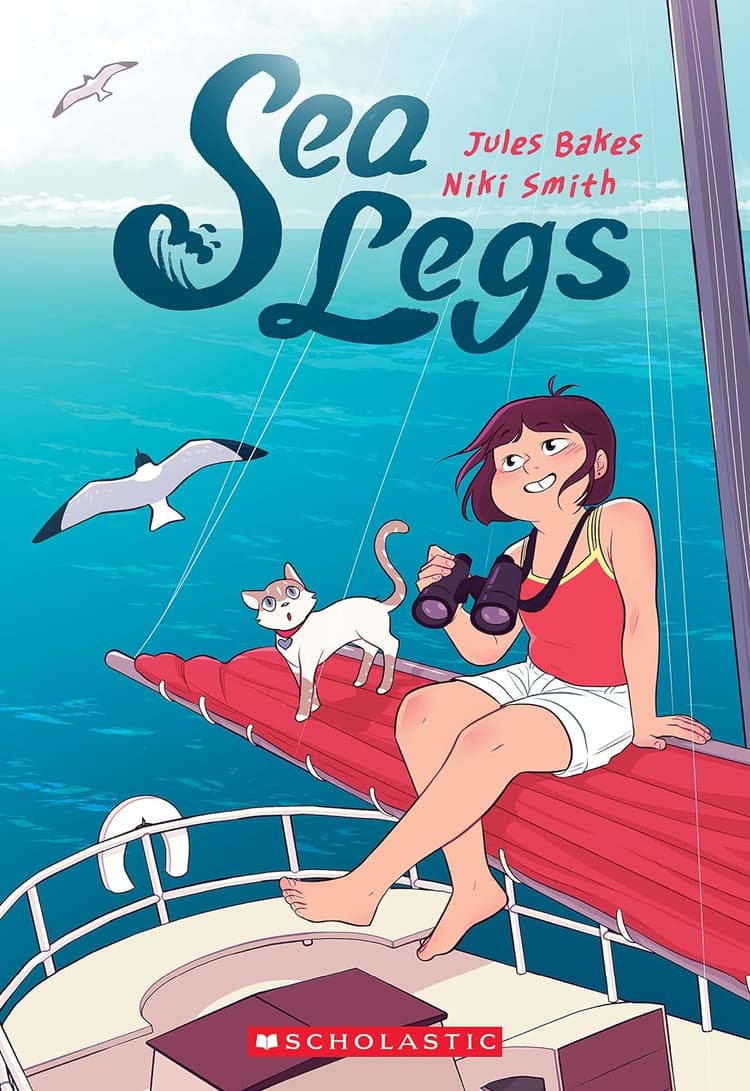 A girl is sitting on a boat with a cat