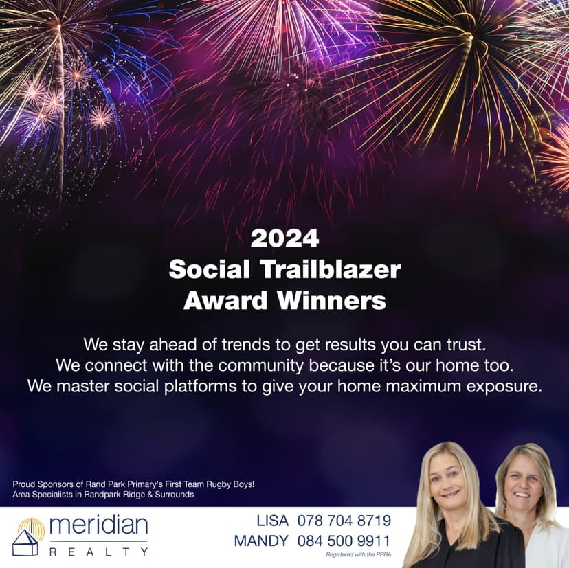 Two women standing next to each other with fireworks in the background