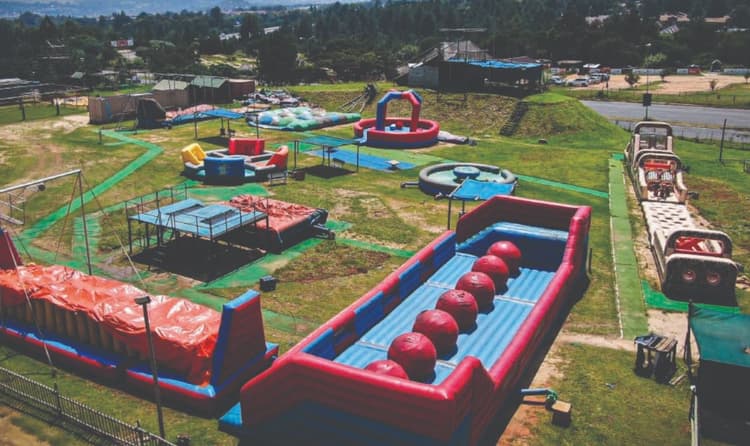 A large inflatable water park with water slides