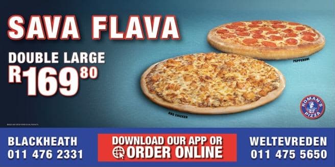 Two large pizzas sitting on top of a table